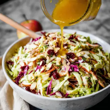 Cranberry Almond Thanksgiving Slaw with Apple Cider Vinaigrette